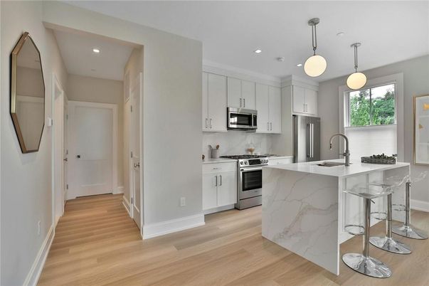 Interior, Kitchen, Pendant Lights, Recessed Lighting, Stainless Steel Appliances, Wood Texture Flooring