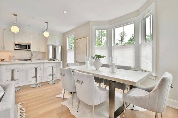 Dining room, Interior, Kitchen, Pendant Lights, Recessed Lighting, Stainless Steel Appliances, Wood Texture Flooring