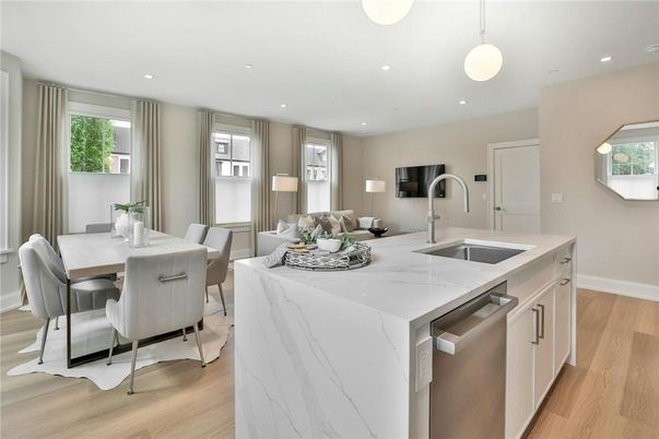 Dining room, Interior, Kitchen, Pendant Lights, Recessed Lighting, Stainless Steel Appliances, Wood Texture Flooring