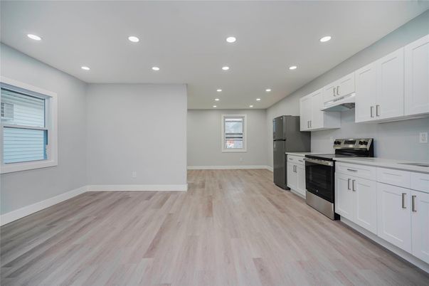 Interior, Kitchen, Recessed Lighting, Stainless Steel Appliances, Wood Texture Flooring