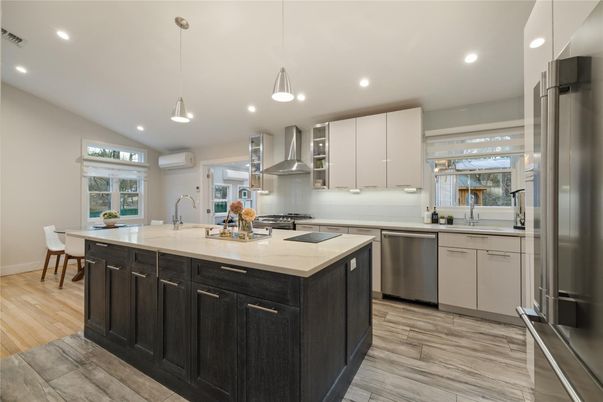 Dining room, Interior, Kitchen, Pendant Lights, Recessed Lighting, Stainless Steel Appliances, Wood Texture Flooring