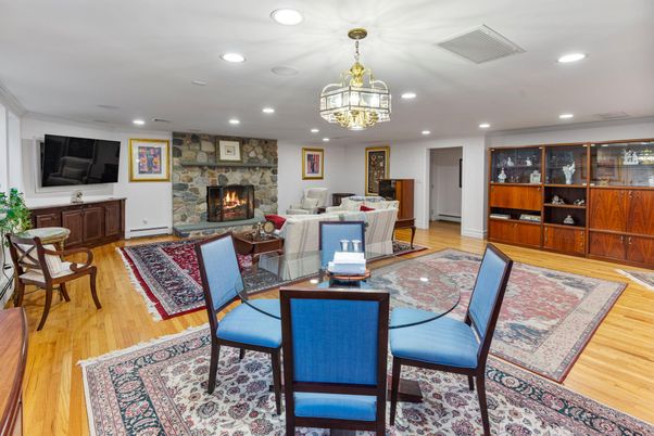 Dining room, Fireplace, Interior, Living room, Recessed Lighting, Wood Texture Flooring
