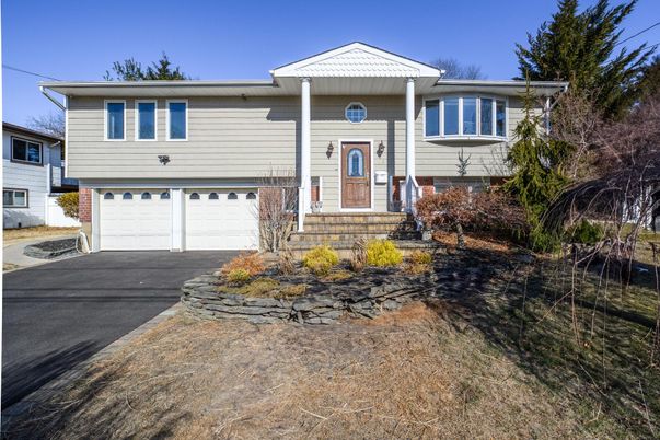 Attached, Exterior, Facade, Raised Ranch