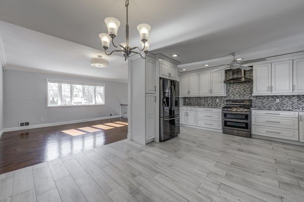 Chandelier, Interior, Kitchen, Recessed Lighting, Stainless Steel Appliances, Wood Texture Flooring