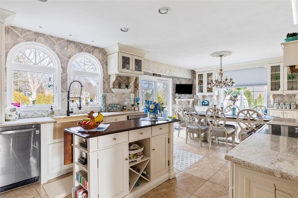 Chandelier, Dining room, Fireplace, Interior, Kitchen, Recessed Lighting, Stainless Steel Appliances