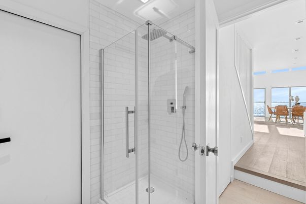 Bathroom, Dining room, Glass Shower, Interior, Recessed Lighting, Wood Texture Flooring
