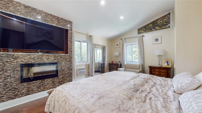 Bedroom, Fireplace, Interior, Recessed Lighting, Wood Texture Flooring