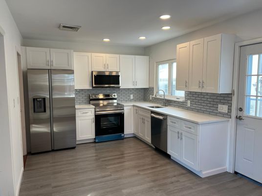 Interior, Kitchen, Recessed Lighting, Stainless Steel Appliances, Wood Texture Flooring