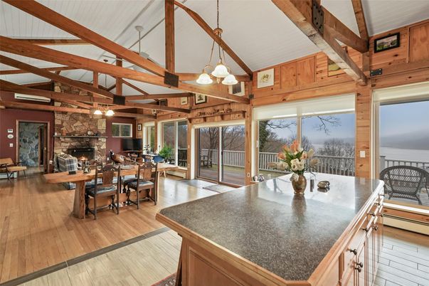 Dining room, Fireplace, Interior, Pendant Lights, Stone Walls, Wooden Beams, Wood Texture Flooring