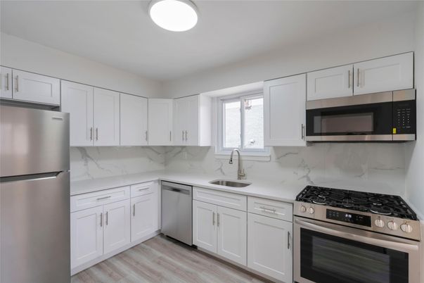 Interior, Kitchen, Marble Walls, Stainless Steel Appliances, Wood Texture Flooring