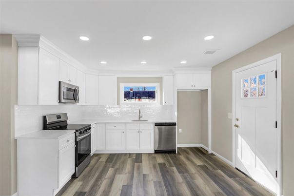 Interior, Kitchen, Recessed Lighting, Stainless Steel Appliances, Wood Texture Flooring