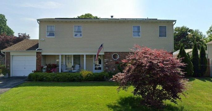 Attached, Backyard, Exterior, Facade, Brick Facade, Split Level