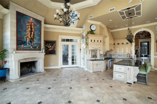 Chandelier, Fireplace, Interior, Kitchen, Recessed Lighting, Stainless Steel Appliances