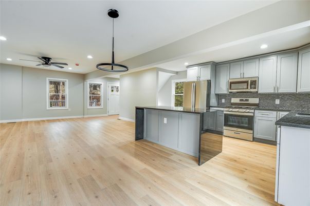 Interior, Kitchen, Pendant Lights, Recessed Lighting, Stainless Steel Appliances, Wood Texture Flooring