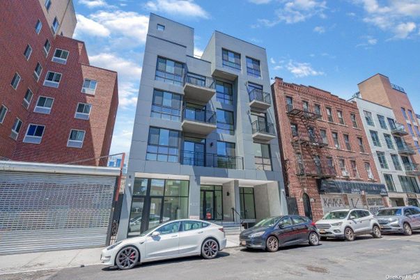 Exterior, Facade, Brick Facade, Condo Building