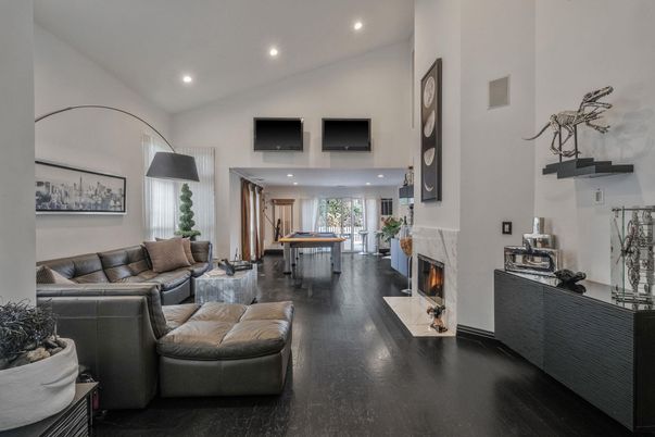 Dining room, Fireplace, Interior, Living room, Recessed Lighting, Wood Texture Flooring