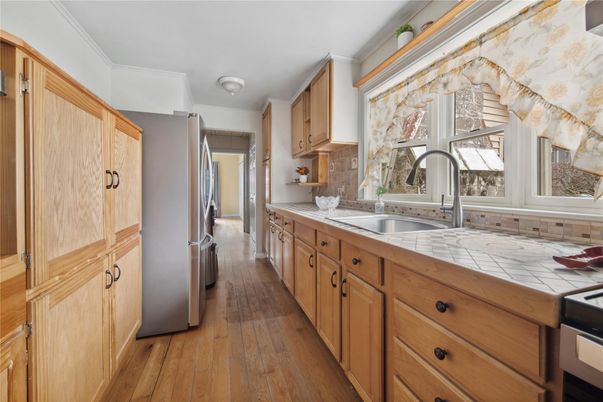 Interior, Kitchen, Tile Countertops, Wood Texture Flooring