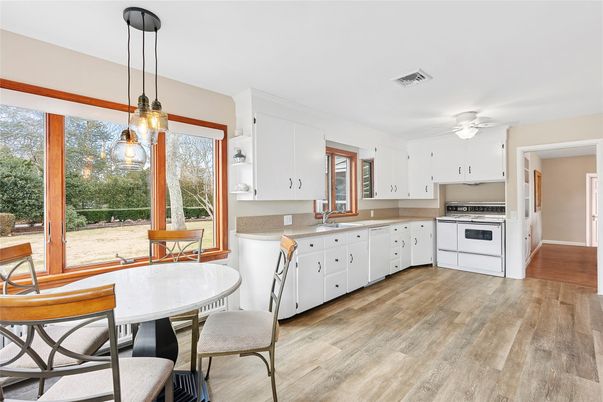 Dining room, Interior, Kitchen, Pendant Lights, Stainless Steel Appliances, Wood Texture Flooring