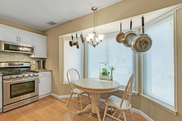 Chandelier, Dining room, Interior, Kitchen, Stainless Steel Appliances, Wood Texture Flooring