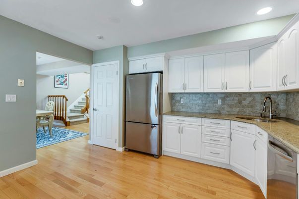 Dining room, Interior, Kitchen, Recessed Lighting, Stainless Steel Appliances, Wood Texture Flooring