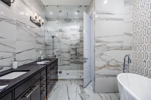 Bathroom, Dual Sink Vanities, Free Standing Baths, Glass Shower, Interior, Marble, Marble Walls, Recessed Lighting
