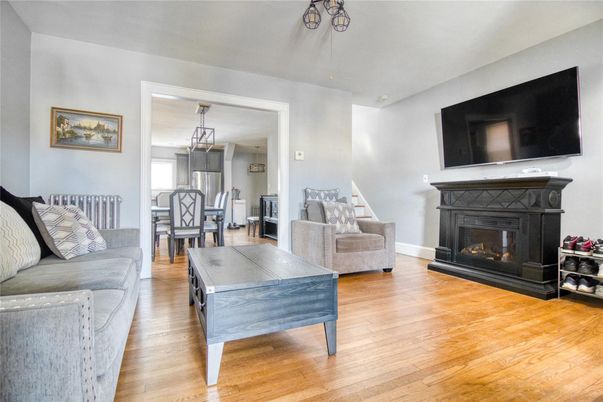 Dining room, Fireplace, Interior, Living room, Pendant Lights, Wood Texture Flooring