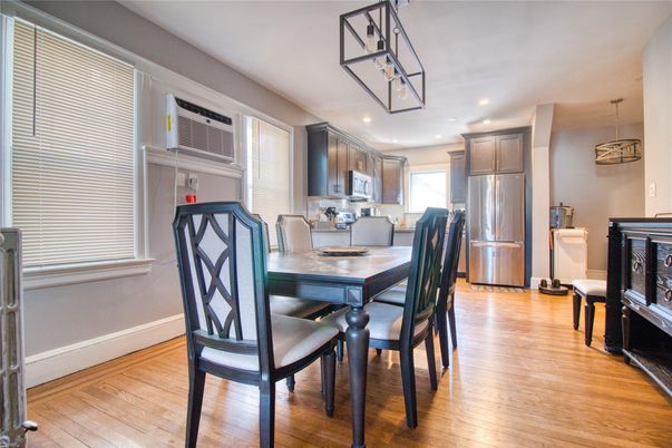 Dining room, Interior, Kitchen, Pendant Lights, Recessed Lighting, Stainless Steel Appliances, Wood Texture Flooring