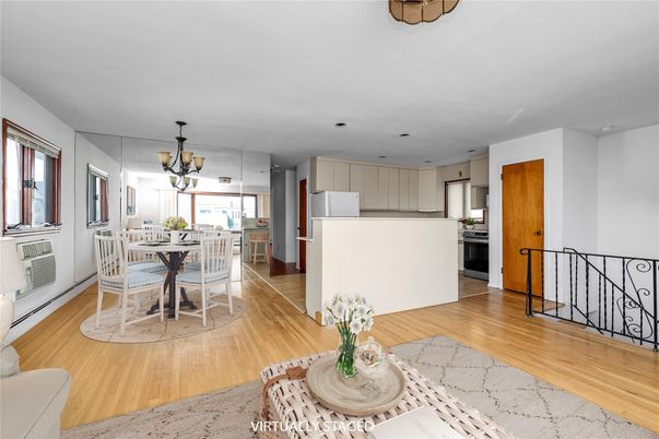 Chandelier, Dining room, Interior, Kitchen, Pendant Lights, Recessed Lighting, Stainless Steel Appliances, Wood Texture Flooring