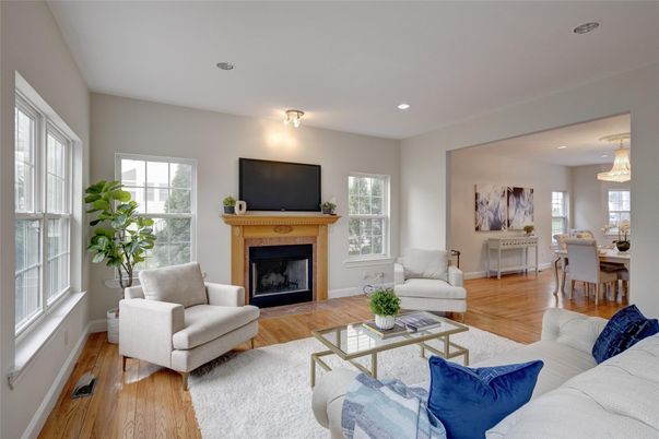 Dining room, Fireplace, Interior, Living room, Recessed Lighting, Wood Texture Flooring