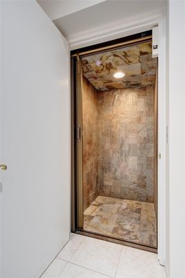 Elevator, Interior, Recessed Lighting, Wooden Ceilings, Wooden Walls
