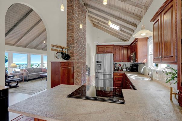 Interior, Kitchen, Living room, Pendant Lights, Stainless Steel Appliances, Stone Walls, Wooden Beams, Wooden Ceilings