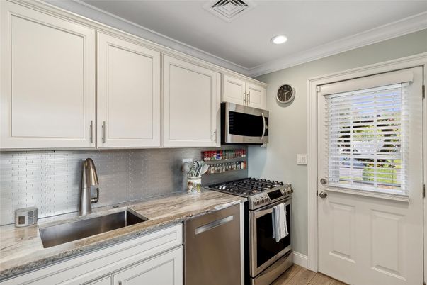 Interior, Kitchen, Recessed Lighting, Stainless Steel Appliances, Wood Texture Flooring