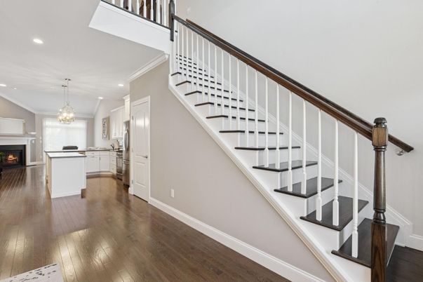 Chandelier, Fireplace, Interior, Kitchen, Recessed Lighting, Wood Texture Flooring
