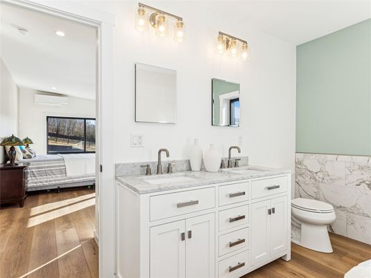 Bathroom, Bedroom, Dual Sink Vanities, Interior, Recessed Lighting, Wood Texture Flooring