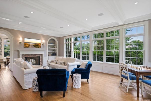 Dining room, Fireplace, Interior, Living room, Recessed Lighting, Wood Texture Flooring
