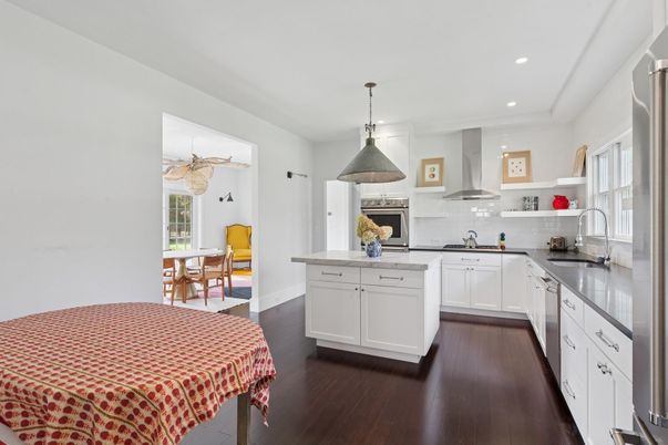 Dining room, Interior, Kitchen, Pendant Lights, Recessed Lighting, Stainless Steel Appliances, Wood Texture Flooring