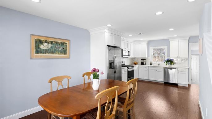 Dining room, Interior, Kitchen, Recessed Lighting, Stainless Steel Appliances, Wood Texture Flooring