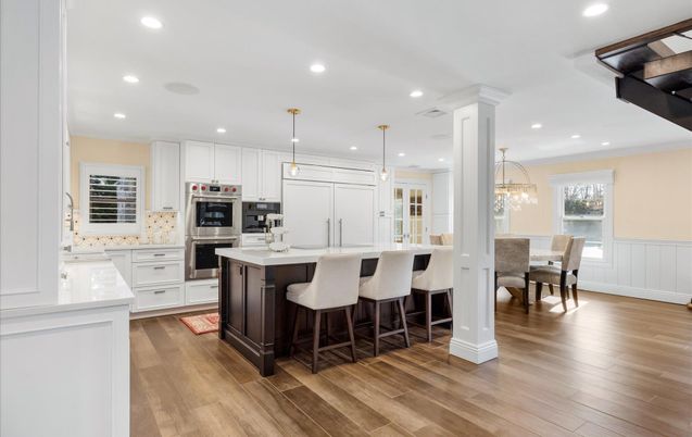 Dining room, Interior, Kitchen, Pendant Lights, Recessed Lighting, Stainless Steel Appliances, Wood Texture Flooring
