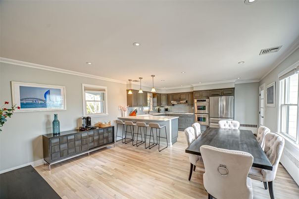 Dining room, Interior, Kitchen, Pendant Lights, Recessed Lighting, Stainless Steel Appliances, Wood Texture Flooring