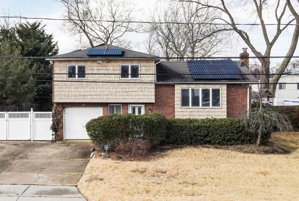 Attached, Exterior, Facade, Brick Facade, Solar Panels, Split Level