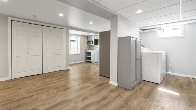 Interior, Kitchen, Recessed Lighting, Washer, Wood Texture Flooring