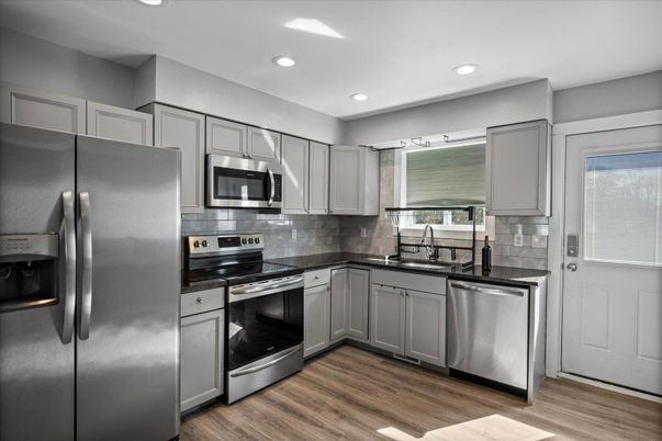 Interior, Kitchen, Recessed Lighting, Stainless Steel Appliances, Wood Texture Flooring