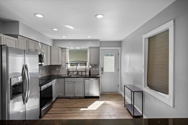 Interior, Kitchen, Recessed Lighting, Stainless Steel Appliances, Wood Texture Flooring
