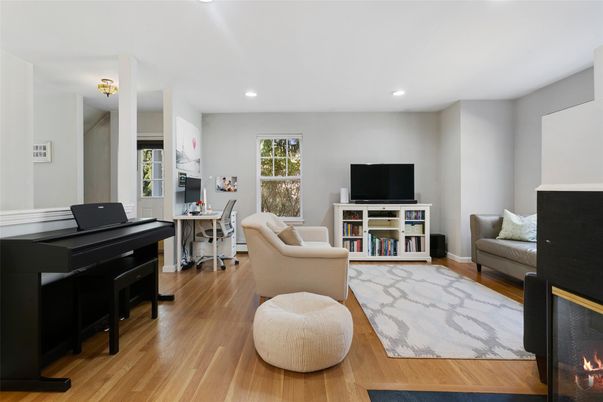 Fireplace, Interior, Living room, Piano, Recessed Lighting, Wood Texture Flooring