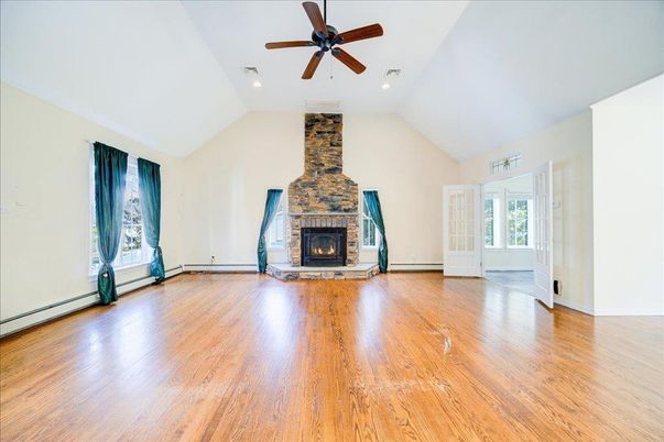 Empty room, Fireplace, Interior, Recessed Lighting, Wood Texture Flooring