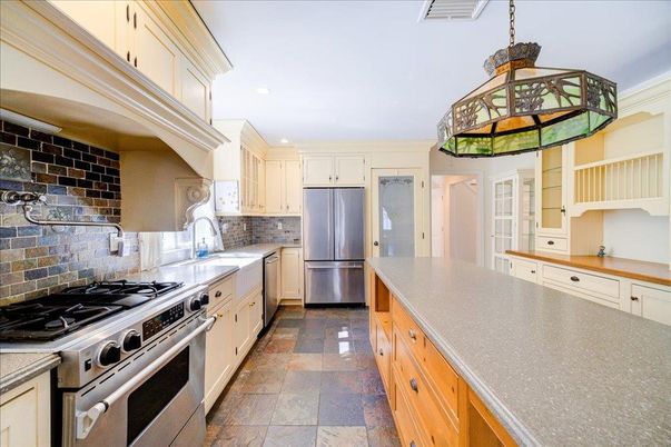 Interior, Kitchen, Pendant Lights, Recessed Lighting, Stainless Steel Appliances, Stone Walls