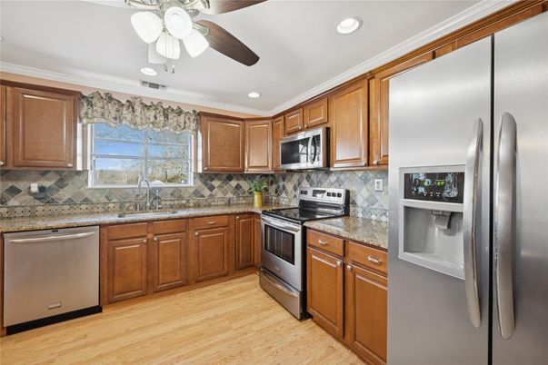 Interior, Kitchen, Recessed Lighting, Stainless Steel Appliances, Wood Texture Flooring
