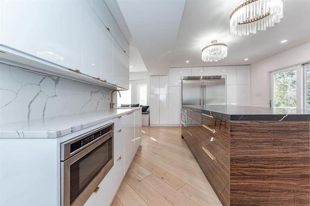Chandelier, Interior, Kitchen, Marble Walls, Recessed Lighting, Stainless Steel Appliances, Wood Texture Flooring