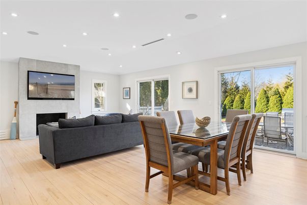 Dining room, Fireplace, Interior, Living room, Recessed Lighting, Wood Texture Flooring