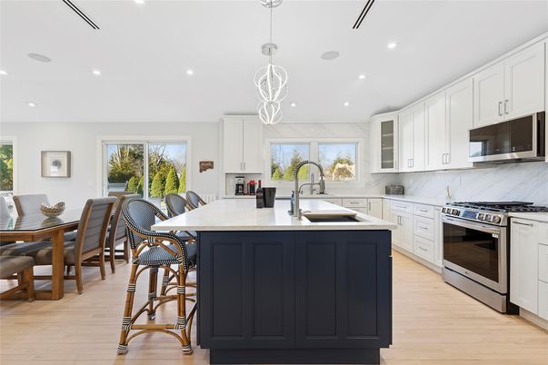 Dining room, Interior, Kitchen, Pendant Lights, Recessed Lighting, Stainless Steel Appliances, Wood Texture Flooring